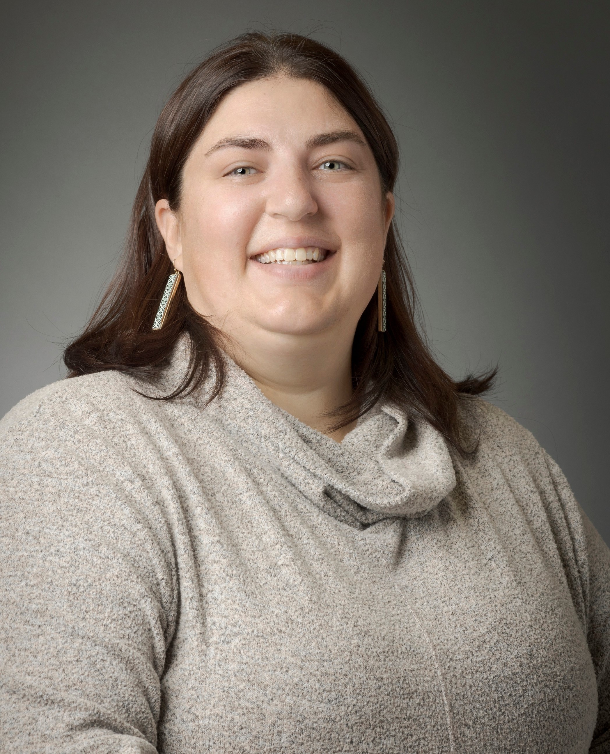 a female scientist with dark hair